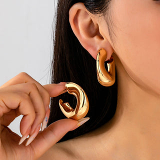 Bold Gold-Tone Chunky Dome Crescent Hoop Earrings | 80E62230-JOSSLYN by wall to wall-The Twisted Chandelier