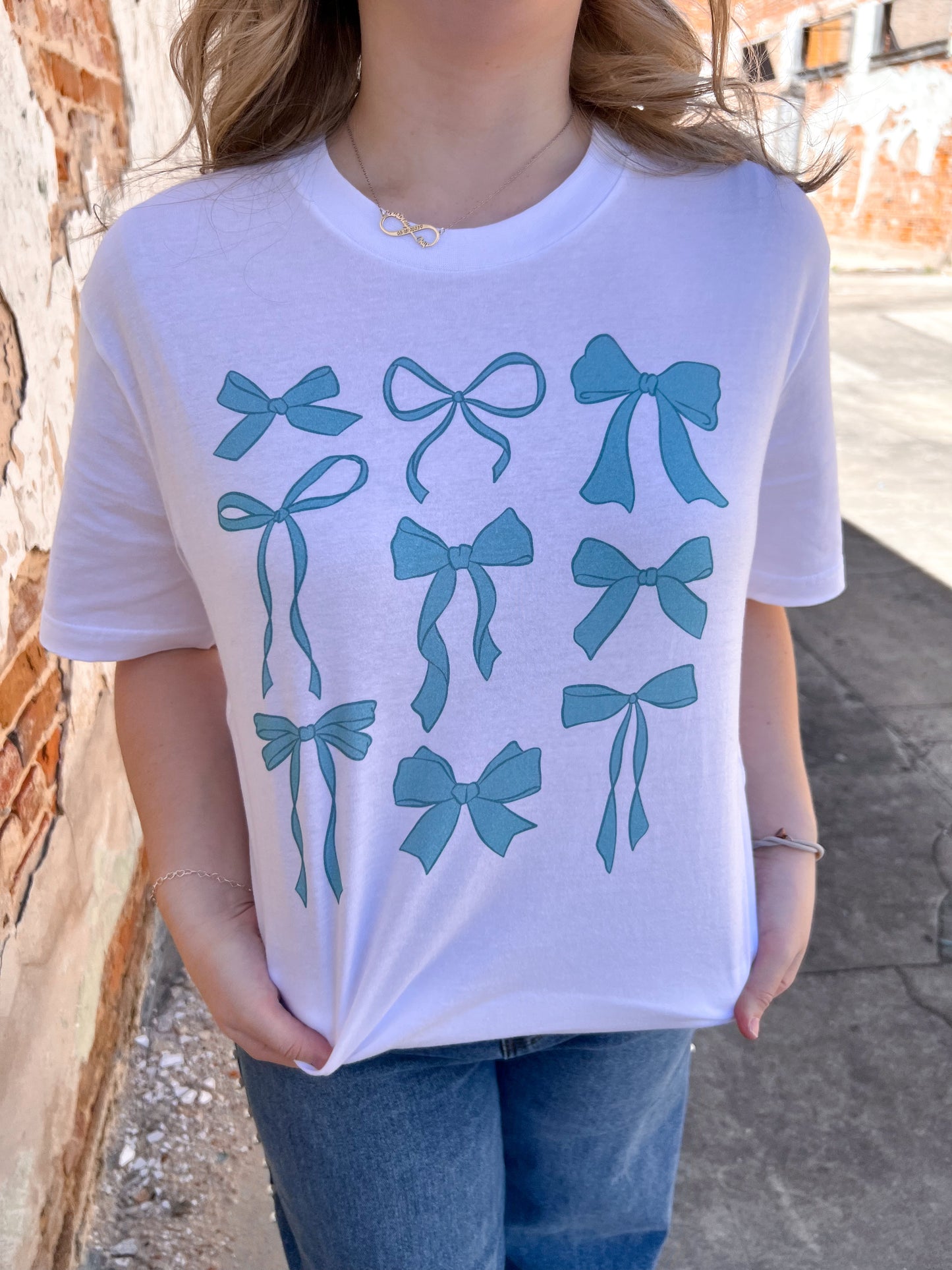 Blue Bow Graphic Tee-Apparel & Accessories-Bling-A-Gogo-08/18/24,11/11/24,1st md,Max Retail,OGP 34.99,Tops Collection-The Twisted Chandelier
