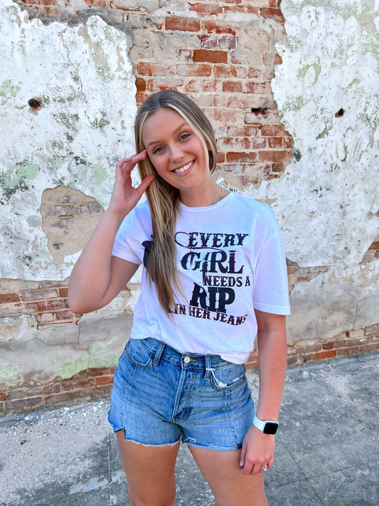Every Girl Needs a Rip In Her Jeans Graphic TShirt-Shirts & Tops-J Coons-05/15/24,1st md,Max Retail,Tops Collection,western & concert-The Twisted Chandelier